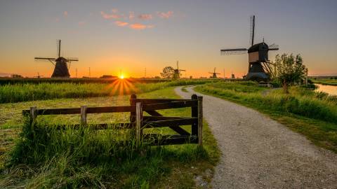 طلوع و غروب خورشید در هلند عکس جاده طبیعت Kinderdijk Mill Grass Fence  طلوع و غروب خورشید ، آسیاب بادی ، آسیاب بادی بارگیری تصویر تصویر بر روی رایانه رومیزی ، قرص 1