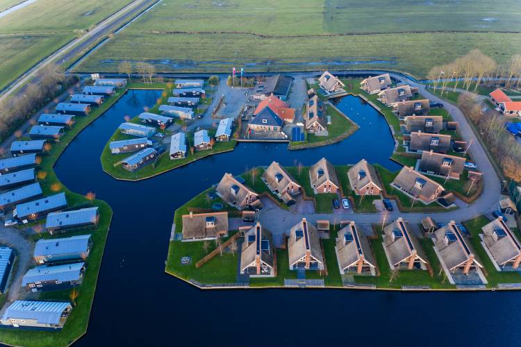 خانه های هلند کانال پارک آبی Terkaple از بالای عکس شهرها  تصویر زمینه ساختمانی 1